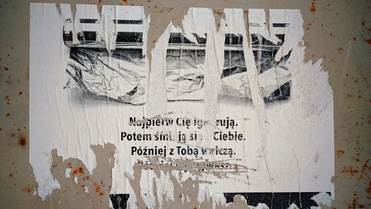 A picture of a sign on the side of a building